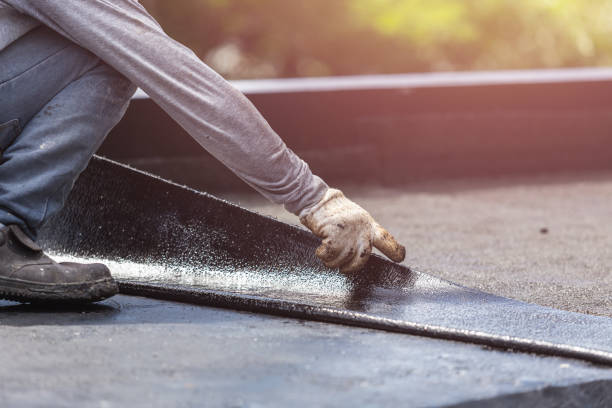 Professional Waterproofing technician working in Williamsburg, KY